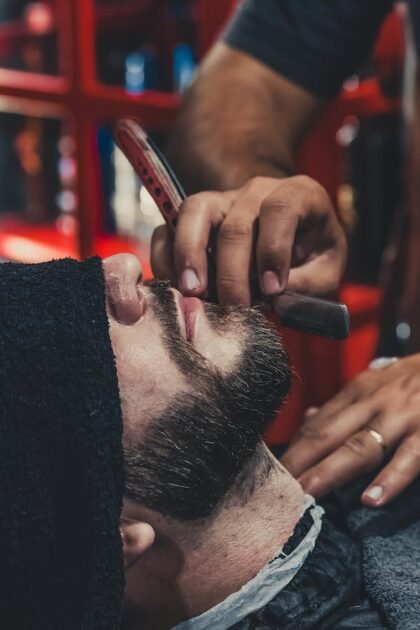 Shaving beards using a straight razor