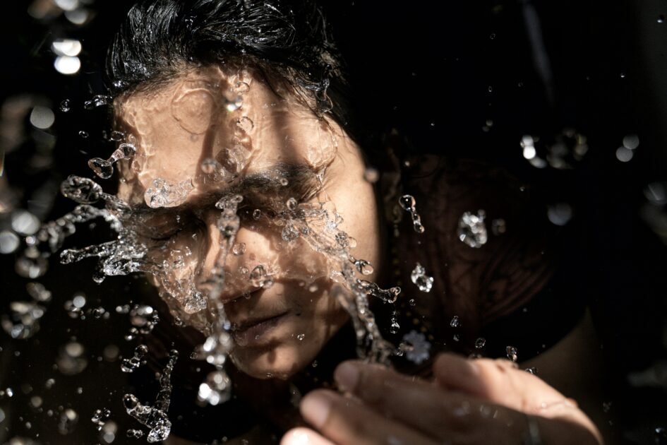 A man washing his face